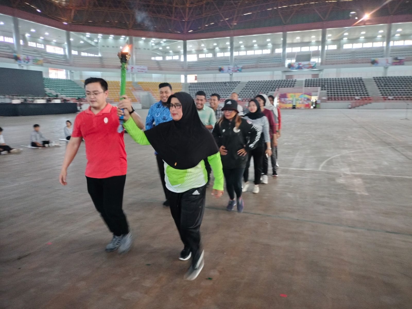 Dahliana-Heriyanto Jadi Pembawa Obor pada Pembukaan Porprovsu 2022