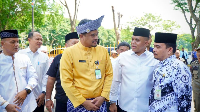 Bobby Nasution Kenakan Busana Adat Melayu di Halal Bihalal Pemkab Langkat, PJ Bupati Langkat Sambut dengan Senyum Bahagia